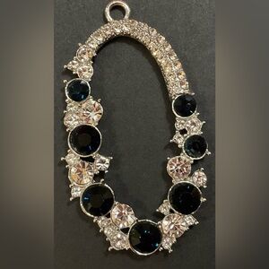 Custom jewelry : oval shaped about / approximately 2 inches black n crystal gems